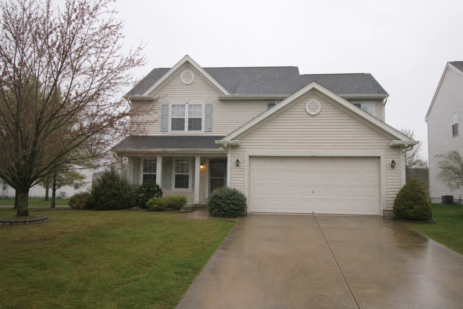 Hazy washed-out house exterior before photo enhancement