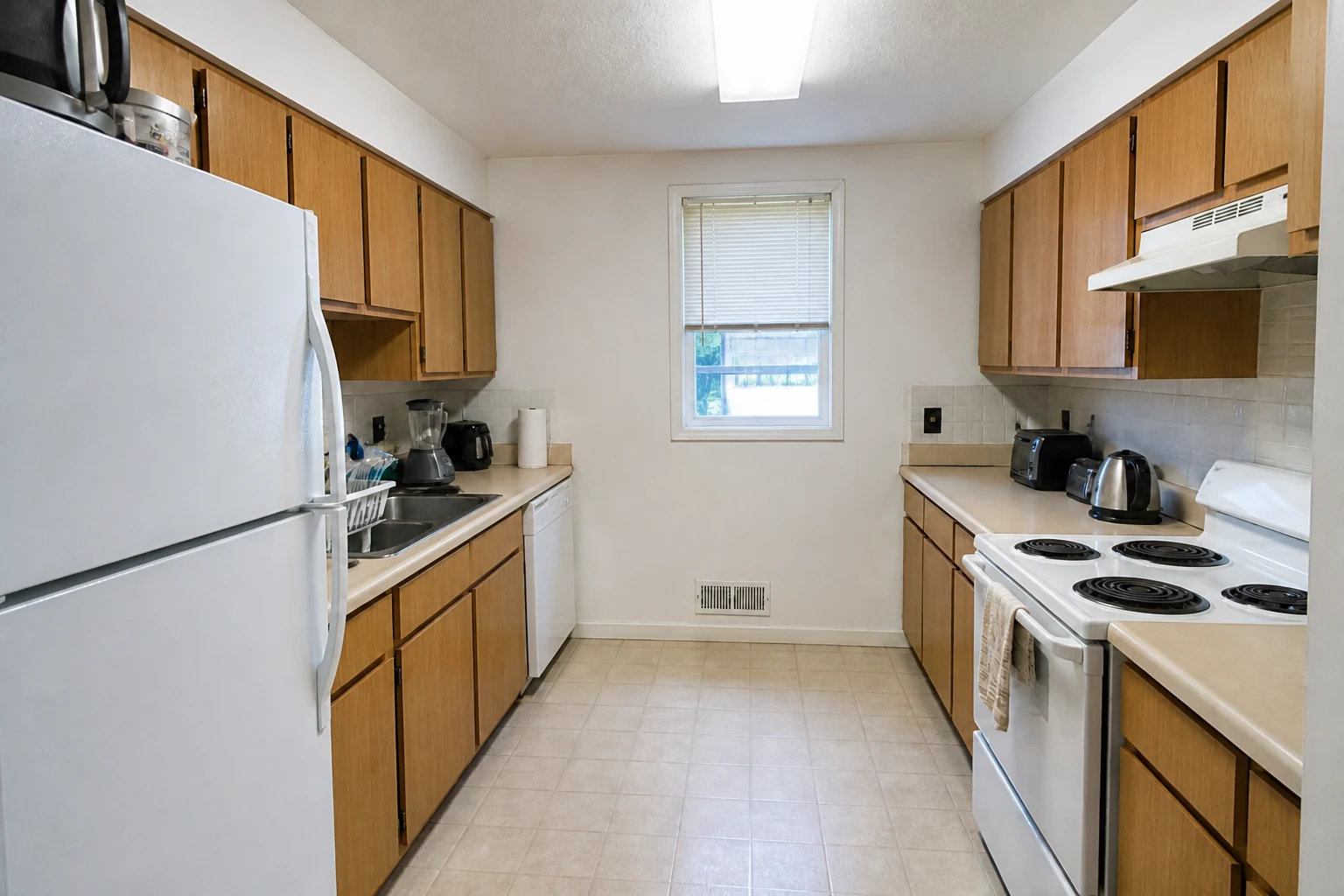 The same kitchen with neutral white balance, cleaner detail, and natural exposure