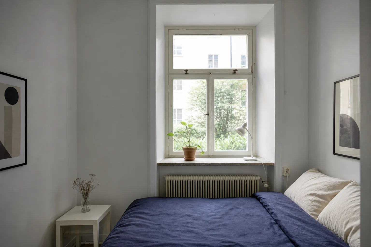 Compact gray city bedroom before an AI small bedroom makeover