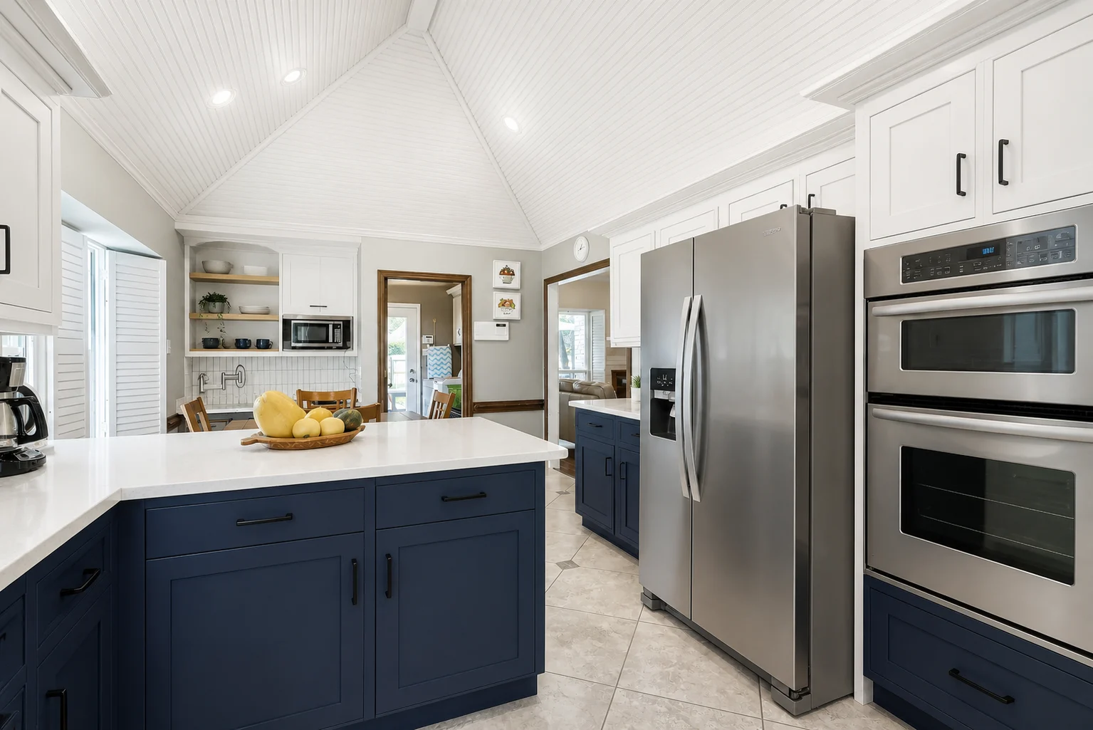 Real wood kitchen redesigned with navy and white finishes