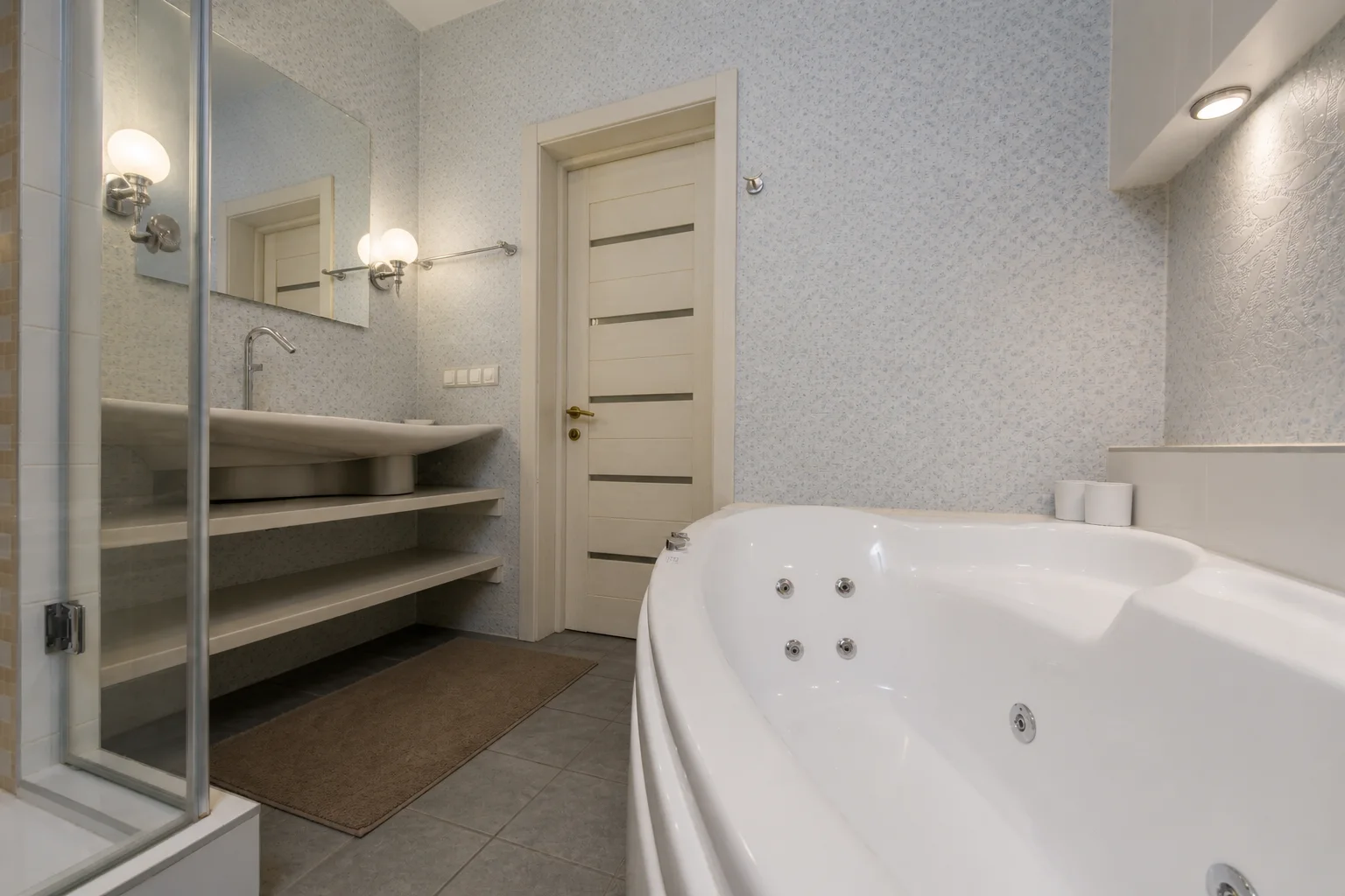 Compact blue-gray bathroom before an AI bathroom makeover