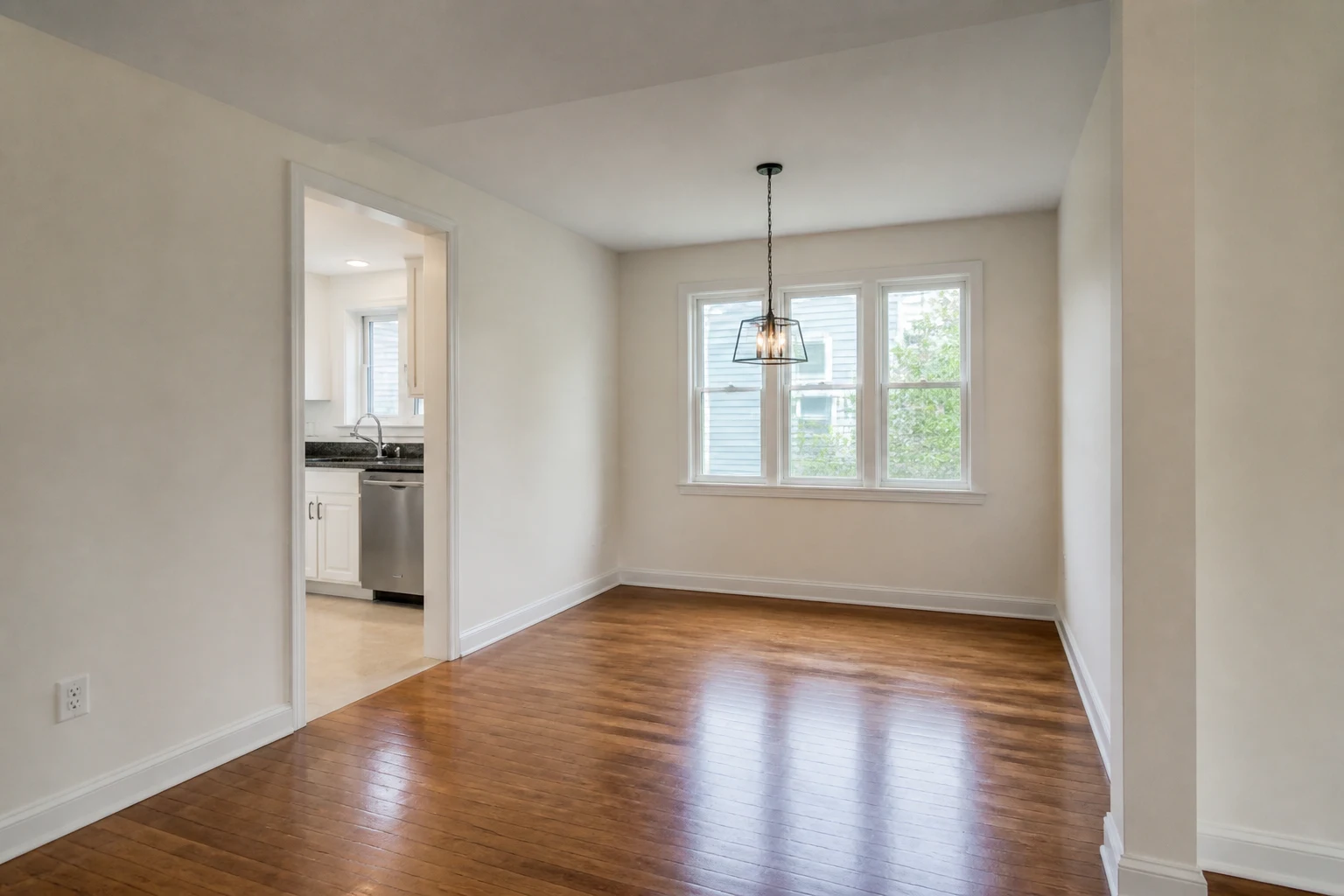 Empty condominium dining room before AI virtual staging