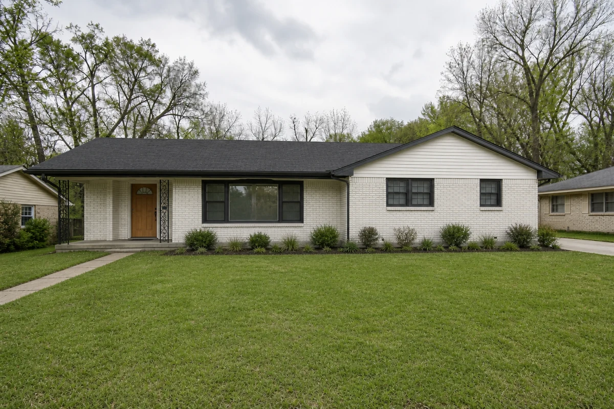 AI exterior design concept for a ranch house with white brick, dark trim, wood entry door, and refreshed landscaping